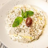 Labneh Appetizers · Vegetarian. Strained yogurt dip topped with mint and a touch of olive oil. Served with pita ...