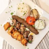 Mix Grill Chargrill · Combination of charcoal grilled kafta, shish kabob and shish ta wouk. Served with grilled to...