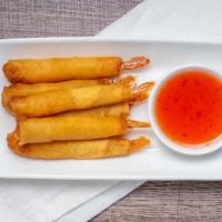 8 Golden Shrimp (6) · Served with sweet & sour sauce.