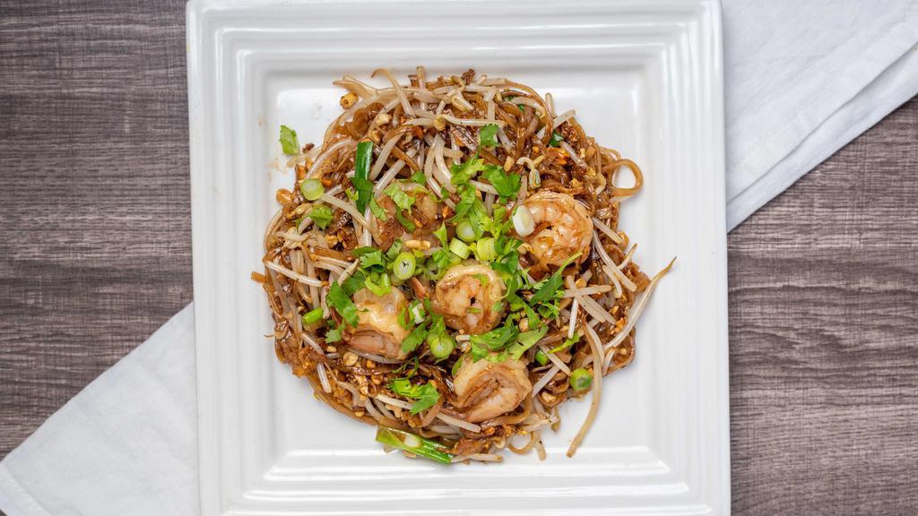 1 Pad Thai · Stir-fried rice noodles with meat, egg, bean sprout, scallion, and ground peanut in pad Thai sauce.