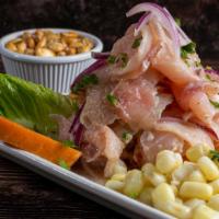Ceviche De Pescado · Spicy. Marinated fish in lime juice, rocoto and other spices.
