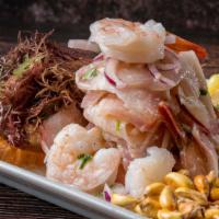 Ceviche  Mixto · Marinated shrimp in lime juice, rocoto and other spices.