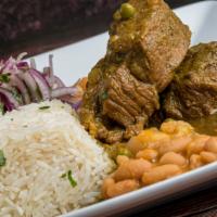 Frejoles Con Seco  De Carne  · tradtional peruvian beef stew,served with rice and beans