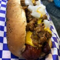 Chili Dog · 1/4 lb. Vienna Beef on Freshly Baked Pretzel Bun - Diced Onions - Home-made Chili Topped wit...