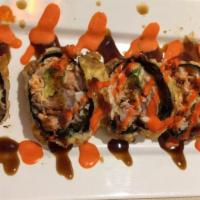 Volcano Roll · 6 pcs, deep fried salmon roll with crabmeat, avocado, tobiko, topped with spicy mayo sauce.