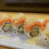 Crunchy Tuna Hidden Dragon Roll · Tempura shrimp & avocado inside, topped with spicy  tuna and crunchy flakes.
(8 pieces per o...