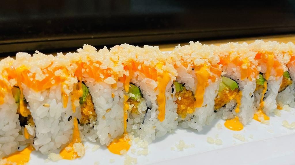 Salmon Lover Roll · Crunchy spicy salmon, avocado inside, topped with salmon, spicy mayo sauce and crunchy flakes.
(8 pieces per order.)