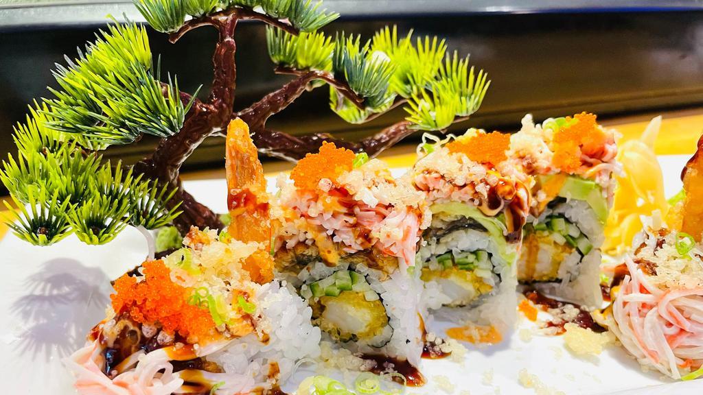 Tokyo Crunchy Dragon Roll · Shrimp tempura, cucumber inside, topped with smoked eel, avocado, crabmeat with mayo, tobiko, crunchy flakes, green onion, eel sauce and spicy mayo sauce.
(8 pieces per order.)