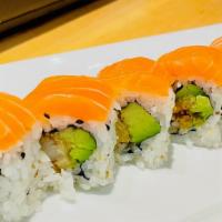 Golden Dragon Roll · Shrimp tempura & avocado inside, topped with fresh salmon.
(8 pieces per order.)