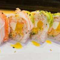 Phoenix Roll · Lobster salad, mango, cucumber and cream cheese, with soy paper wrapped around, topped with ...