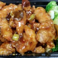Orange Chicken · Fried battered chicken sauteed in tangy spicy sauce, garnished with steamed broccoli