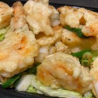 Salt And Pepper Jumbo Shrimp · Crispy jumbo shrimp sauteed in salt, pepper and jalapeno.  Add extra proteins for an additio...