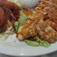Teriyaki Chicken · Grilled chicken drizzled in teriyaki sauce, served with mixed green and rice