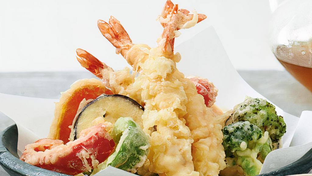 Shrimp Tempura · Tempura battered  shrimp and garden vegetables, fried to crispy, and served with tempura sauce on the side
