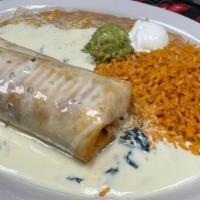 Chimichanga · Topped with guacamole and sour cream.