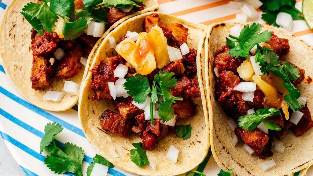 Tacos Al Pastor (3 Pieces) · New! Marinated pork with pineapple, topped cilantro, onions, side rice.