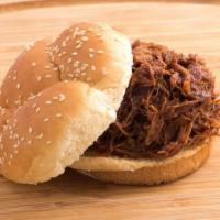 Pulled Pork · 1/4 Pound (4 OZ) Pulled Pork - Customize it the way you want! Served on our traditional seed...