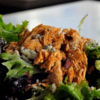 The Ridge Smoked Chicken Salad · Spring mix lettuce tossed with house citrus vinaigrette and topped with pecans, Bartlett pea...
