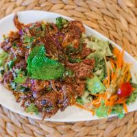 Grilled Beef Salad · Gluten-free. Mild spicy. Beef, sliced and tossed mixed with red onion, scallions, cilantro s...