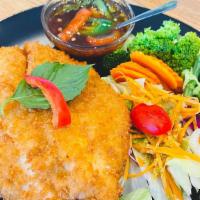 Basil Crispy Fish (Filet Tilapia) · Mild spicy. Lightly battered and fried, serve with fresh chili and garlic sauce. Steamed veg...