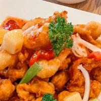 Tangy Twin · Lightly battered jumbo shrimp &  crispy chicken , glazed with homemade sweet & sour sauce (B...