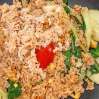 Crabmeat Fried Rice · Stir fried jasmine rice, onions, scallions, tomatoes, Chinese broccoli and eggs with special...