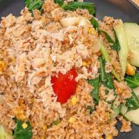 Crab Meat Fried Rice · Stir fried jasmine rice, onions, scallions, tomatoes, Chinese broccoli and eggs with special...