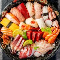Sushi & Sashimi Platter* · Thirty pieces of assorted sashimi, twenty-four pieces of nigiri sushi with california roll, ...