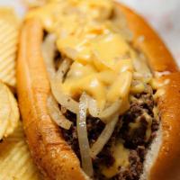 Iconic Cheesesteak · Steak, pepper, and onions, housemade cheddar cheese whiz, served with fries