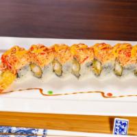 American Dream Roll · Shrimp tempura & cucumber, topped with spicy crab meat and eel sauce.