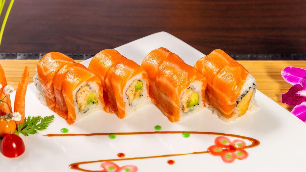 Golden Salmon Roll · Salmon tempura, avocado, topped with salmon, chef's special sauce.