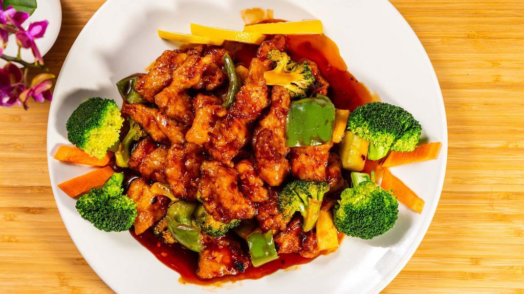 Orange Chicken (Spicy) · Deep-fried white meat chicken, broccoli zucchini and peppers with chef's special sauce.