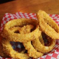 Onion Rings · Hand breaded and gently fried.