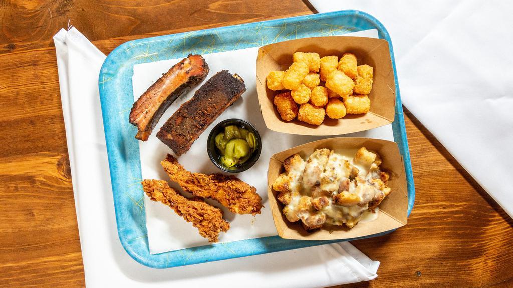 Pick 2 Meats (Different Meats) & 2 Sides · Your choice of two ribs bones, pulled pork, sausage, or chicken & two sides & sweet pickles. PLEASE PICK TWO DIFFERENT MEATS.