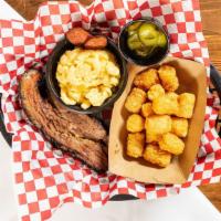 Pick 1 Meat & 2 Sides · Your choice of pulled pork, sausage, or chicken & two sides & sweet pickles.