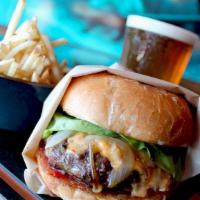 Duck Dive Burger
 · 1/2 pound all-natural beef patty, pimento cheese, tomato relish, caramelized onions, lettuce...