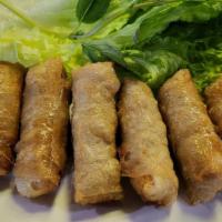 Vietnamese Spring Rolls (Chả Giò) · Crispy fried rolls filled with ground pork, shrimp, and wood ear mushroom.