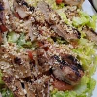 Vietnamese Salad With Grilled Chicken Thigh (Gỏi Gà Nướng) · Contains nuts. Includes grilled chicken thigh, lettuce, tomatoes, cucumbers, pickled carrots...