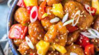 Sweet & Sour Chicken · Served with egg roll and pork fried rice.