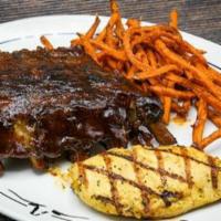Bbq Pork Ribs & Grilled Chicken · “Fall-off-the-bone” ribs & marinated grilled chicken breast. Served with a side & your choic...