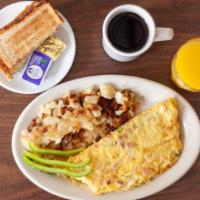 Western Omelette · Made with ham, green peppers & onions.