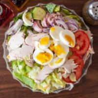 Chef'S Salad · Lettuce, tomatoes, cucumbers, red onions, green peppers, ham and turkey, and hard boiled egg