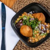 Samosa Chaat · Most popular. Served with chickpeas, onions, cilantro, sweet chutney, and spicy chutney. Veg...