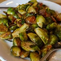 Roasted Brussel Sprouts · spiced maple bourbon butter / candied bacon