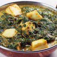 Saag Paneer · Homemade Cheese cubes in a thick curry sauce based on pureed spinach