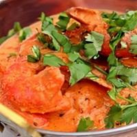 Shrimp Tikka Korma · Shrimp baked in clay oven & cooked with spicy sauce with bell peppers and onions.
