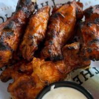 Wings (8 Wings) · All wings are smoked and finished on our grill! They come in orders of 8 or 16 and we have s...