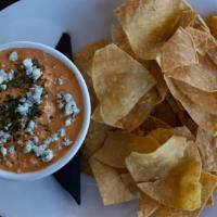 Buffalo Chicken Dip · Creamy buffalo dip loaded with shredded chicken and a hint of bleu cheese. Served with light...