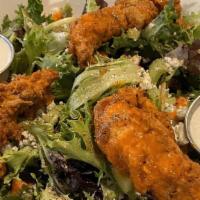Buffalo Chicken Salad · Mixed greens, celery, carrots, and bleu cheese crumbles, topped with three fried chicken ten...