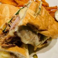 Havana-Style Cuban · Smoked pulled pork, smoked ham, spinach, and sliced pickles along with Swiss cheese and dijo...